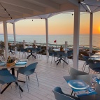 Beach restaurant at sunset