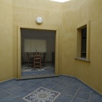 SALA DA PRANZO VISTA DALLA LOGGIA INTERNA ALLA CASA